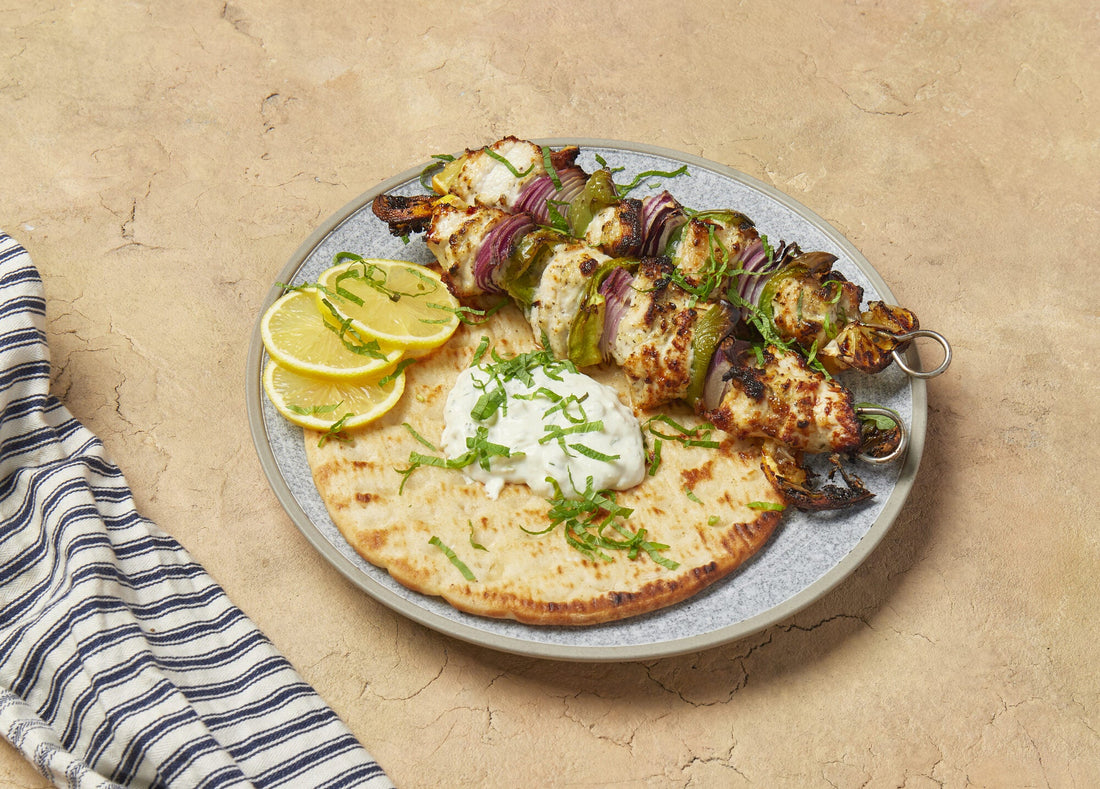 Toum Marinated Chicken Skewers with Toasted Pitta Bread, Tzatziki, Lemon & Capsicum