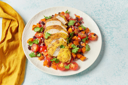 Polenta Spiced Chicken with warm sweet potato and bean salad