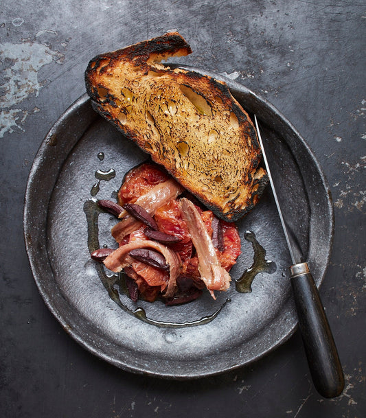 Grilled Bread with Slow-Cooked Blood Orange, Anchovies and Black Olives