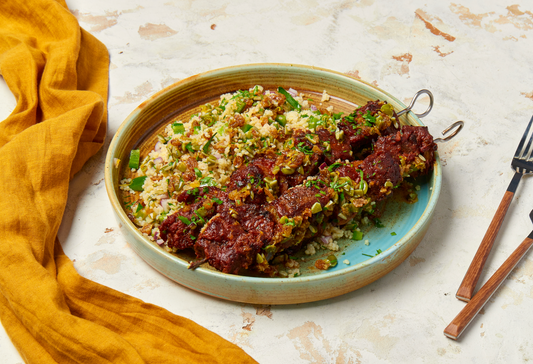 Beef Skewers with Couscous Salad & Lemon Raisin Dressing