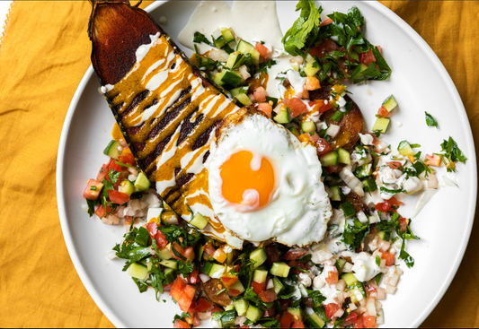 Roasted Eggplant Sabich with Egg, Israeli Salad, Tahini & Amba