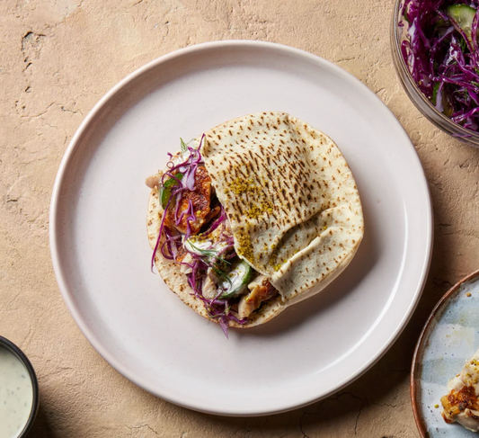 Za'atar Chicken Pita Pockets with Green Tahini, Cabbage, Cucumber & Mint