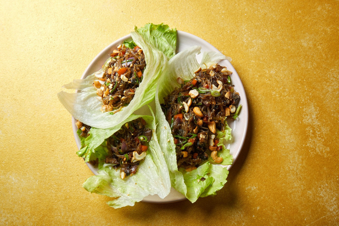 Mushroom san choy bow in iceberg lettuce cups topped with cashews