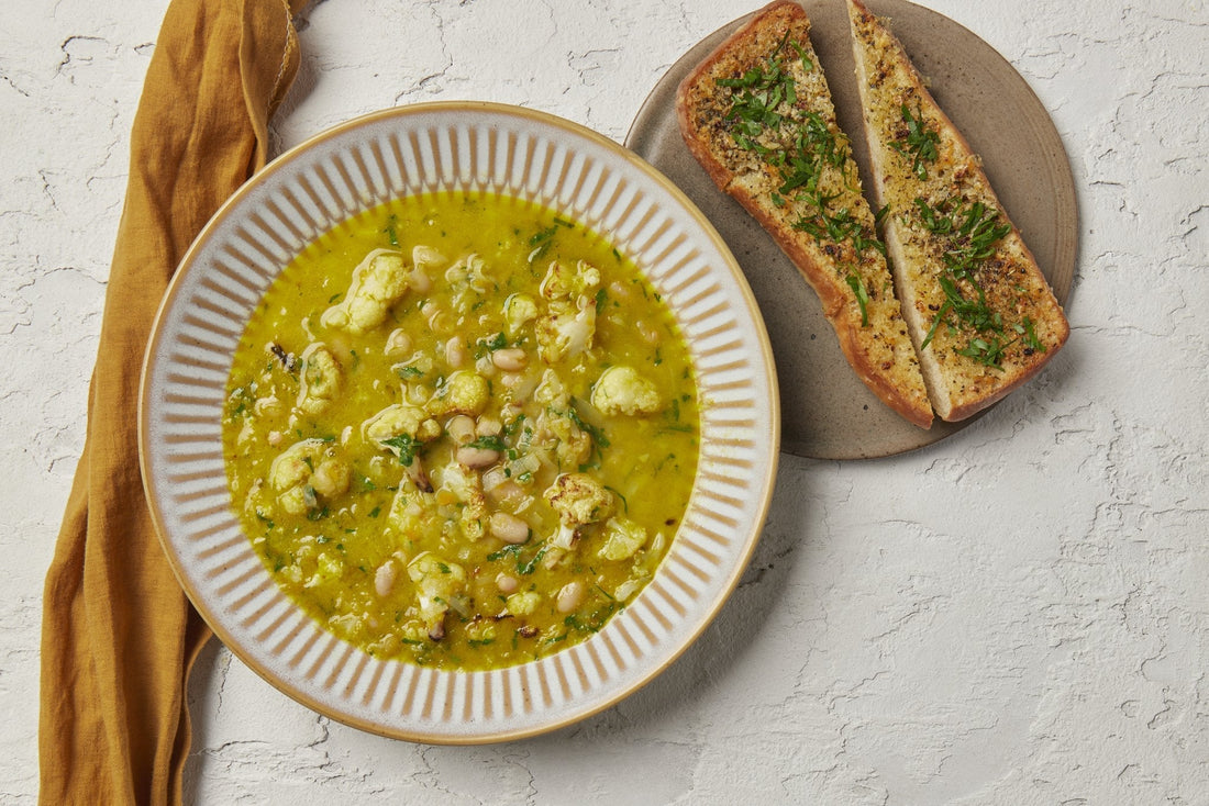 White bean and cauliflower soup with cheesy garlic toast