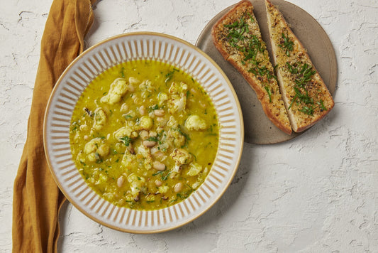 White bean and cauliflower soup with cheesy garlic toast