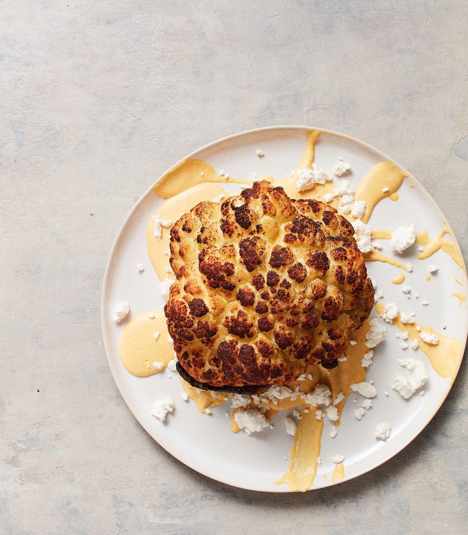 Burnt Cauliflower with Ocopa Sauce and Crumbled White Cheese